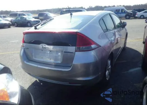 2011 Honda Insight Ex z USA, uszkodzony, nr VIN JHMZE2H74BS003866